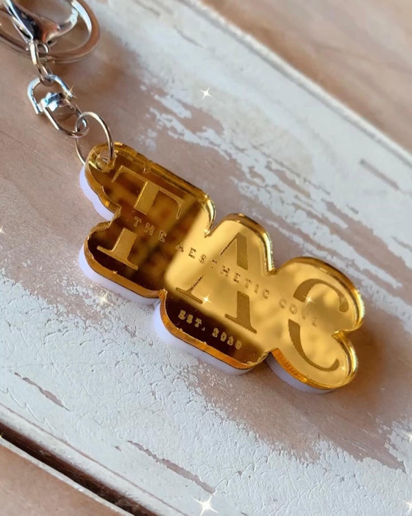 Personalised bubble mirror keyring in double layered acrylic with an engraved name and lobster clasp