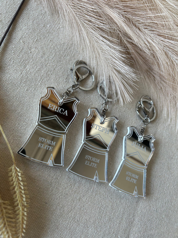Personalised cheerleader keyring in double layered mirrored acrylic with name and club