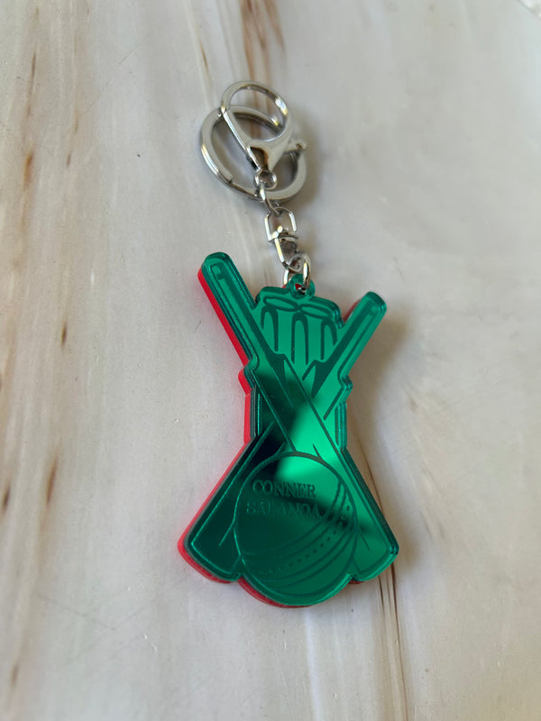 Personalised cricket keyring with ball, bat and stumps in mirrored acrylic, engraved with a name