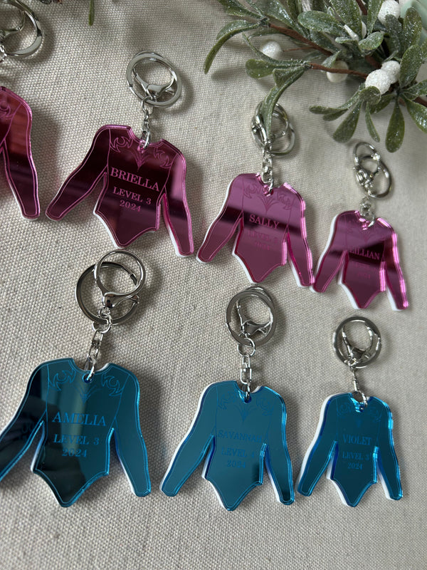 Personalised gymnastics leotard keyring in double layered mirrored acrylic with name and club