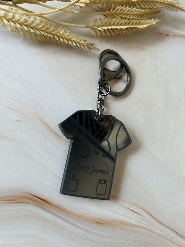 Personalised male nurse scrubs keyring in double layered mirrored acrylic with their name