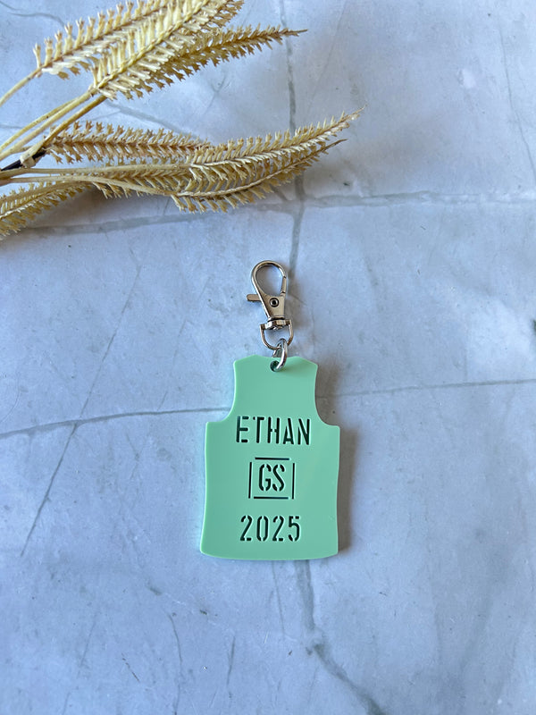 Personalised netball singlet bag tag in 3mm acrylic with player name and position