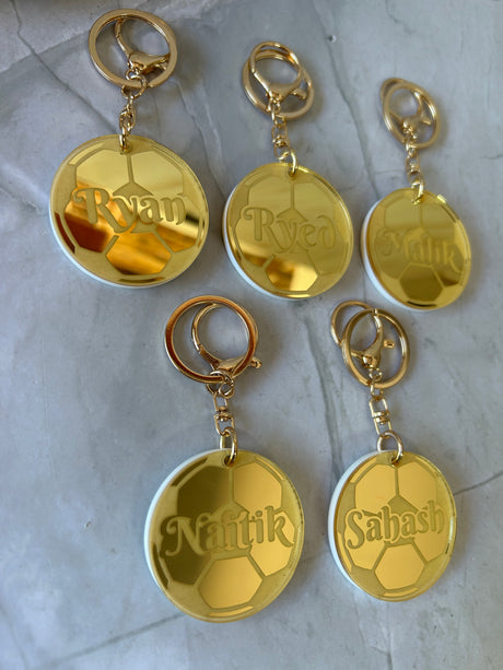 Personalised sporting keyring with name and team colours in laser-cut acrylic, choose your sport