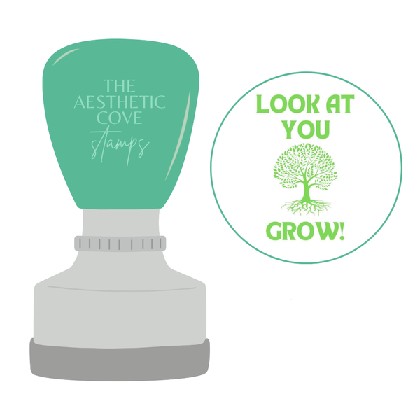Self inking teacher stamp with green ink for classroom marking