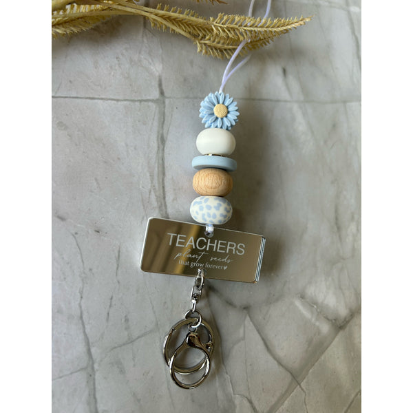 Personalised teacher lanyard in silicone beads with an engraved acrylic name piece