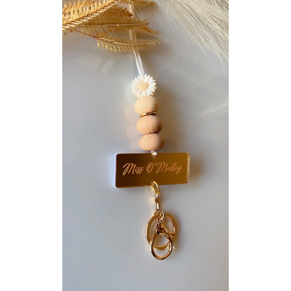 Marie silicone beaded lanyard with a personalised engraved mirrored acrylic piece