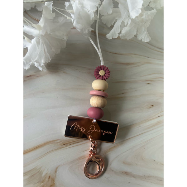 Victoria silicone beaded lanyard with a personalised engraved mirrored acrylic piece