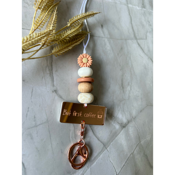Peachy silicone beaded lanyard with a personalised engraved mirrored acrylic piece