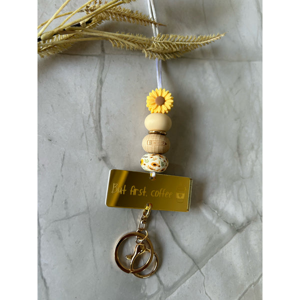 Sunny personalised teacher lanyard in silicone beads with an engraved acrylic name piece