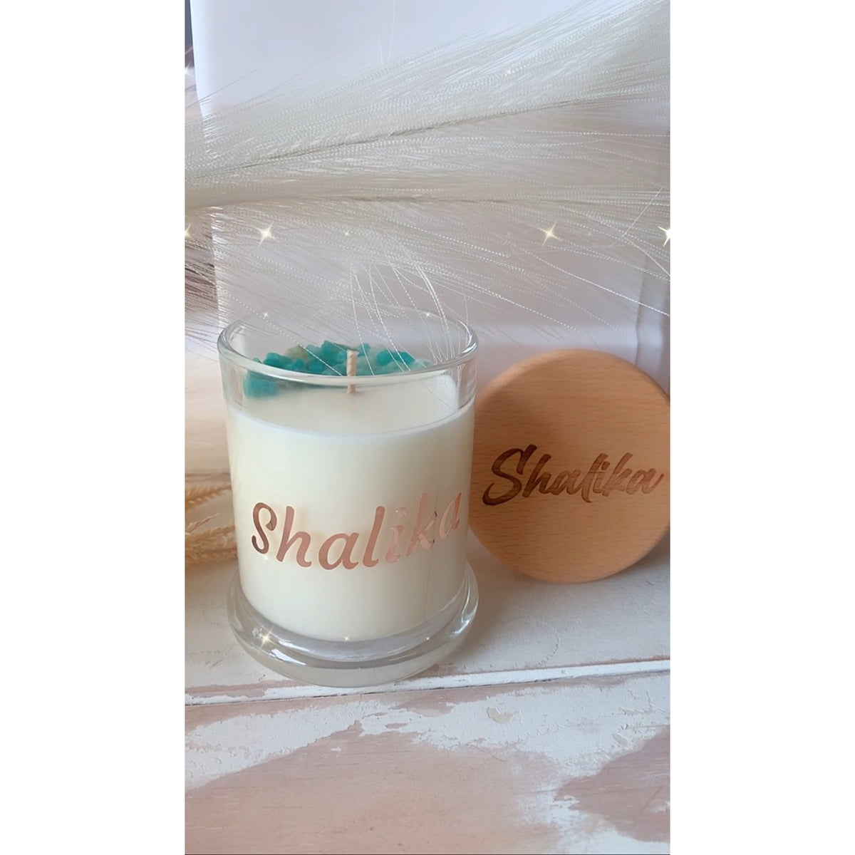 Soy candle with an engraved wooden lid and infused crystal chips