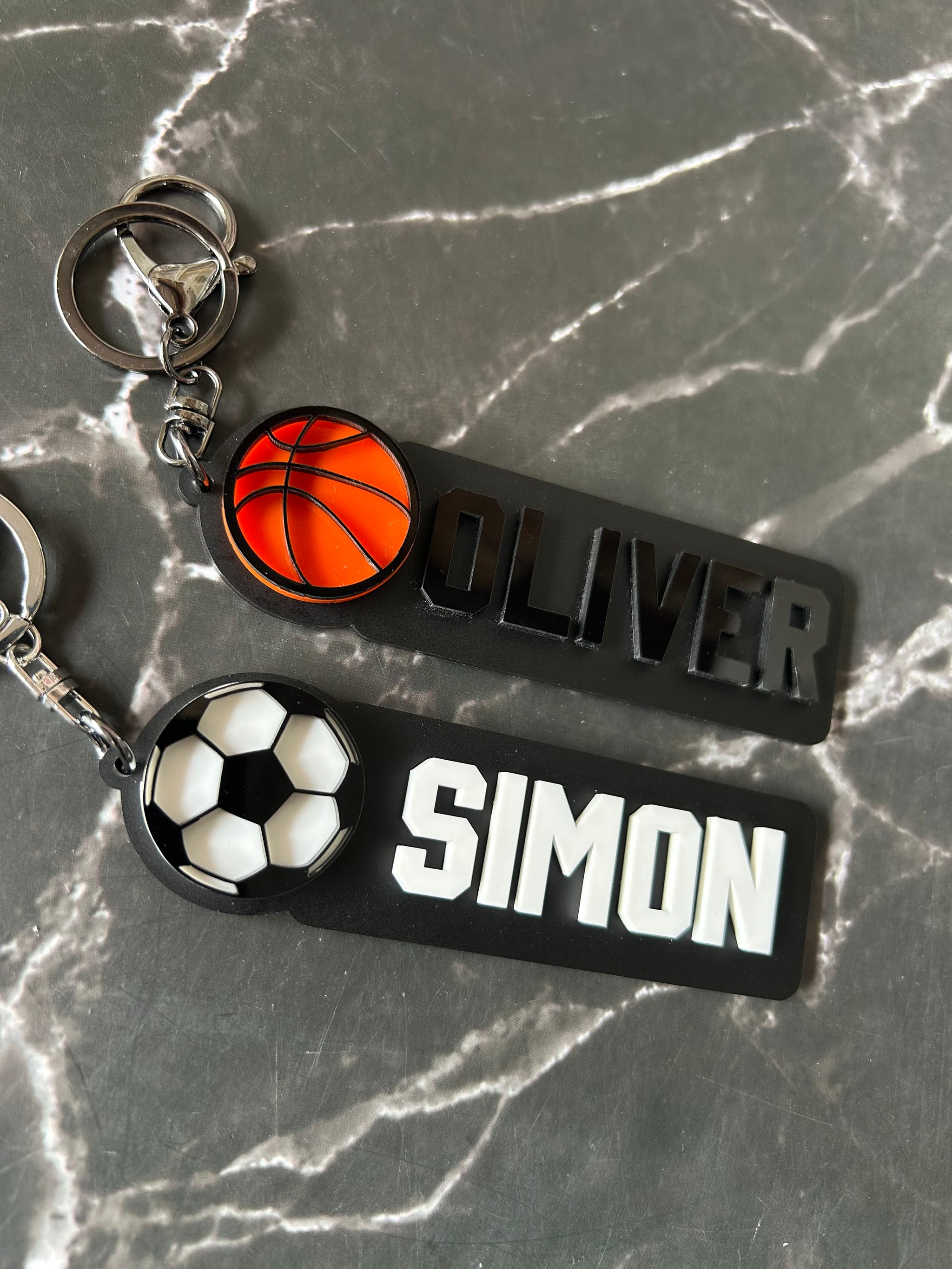 Elongated Sports Keychains