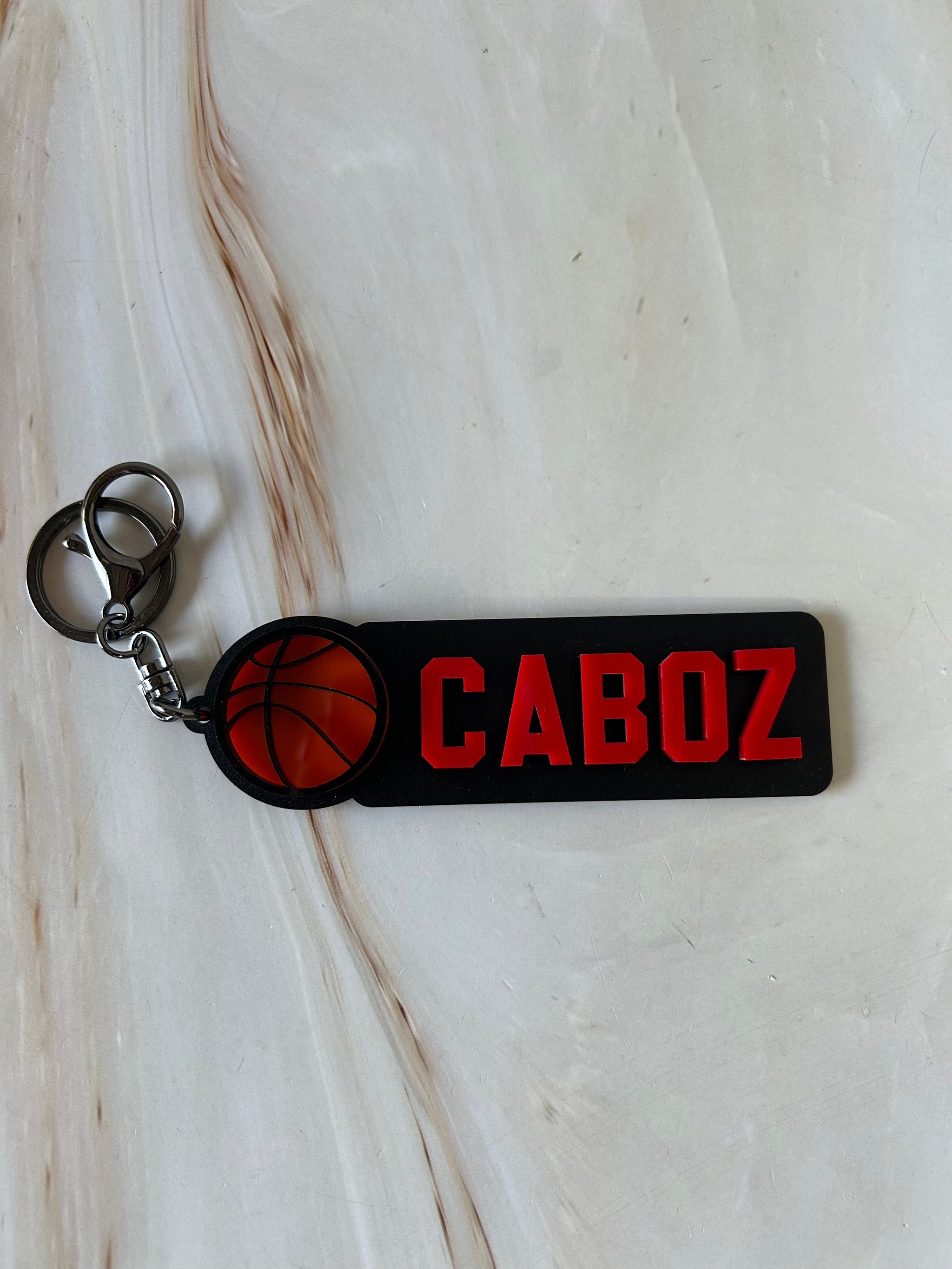 Elongated Sports Keychains