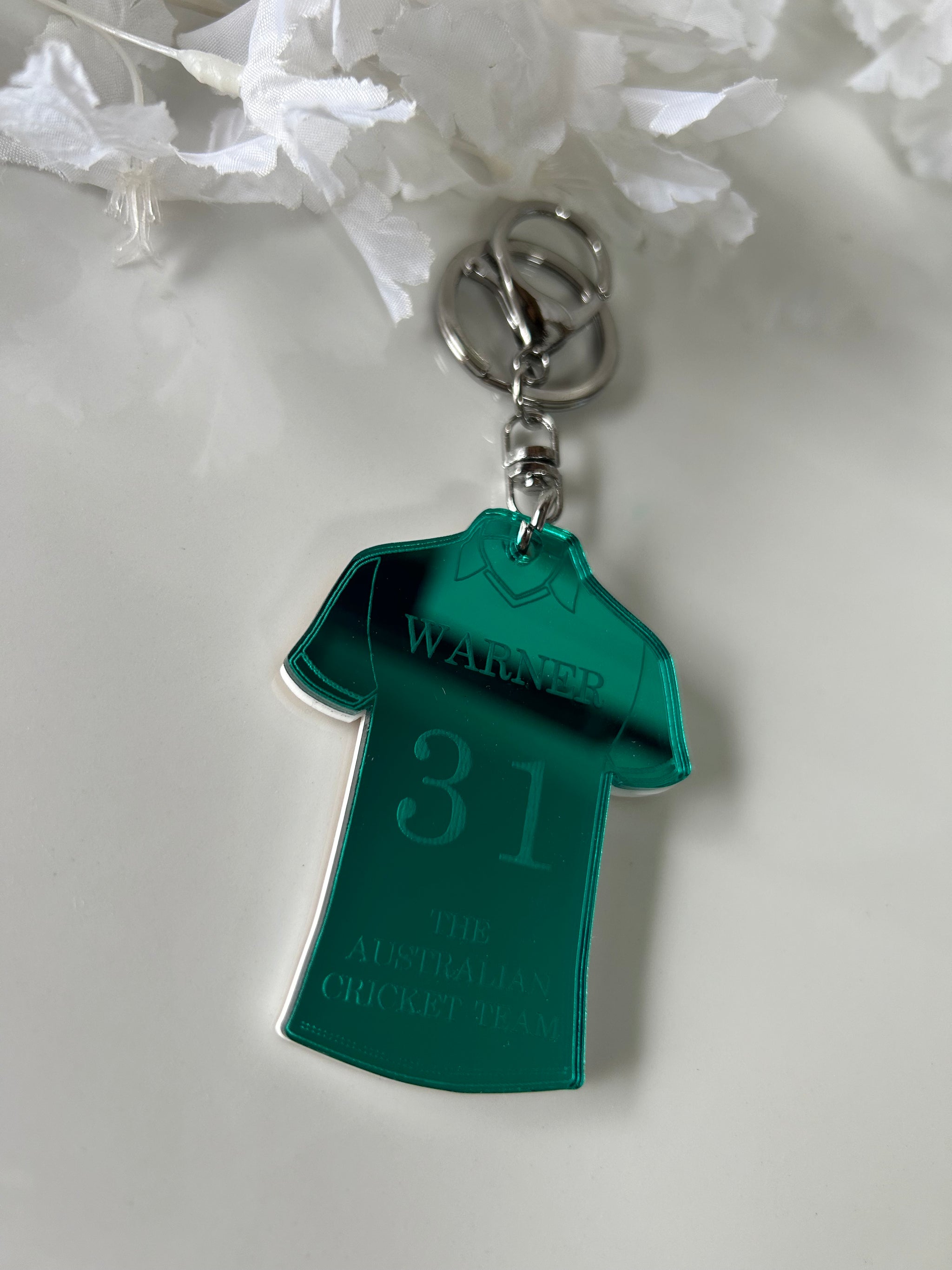 Personalised cricket jersey keychain in acrylic with name, number and club