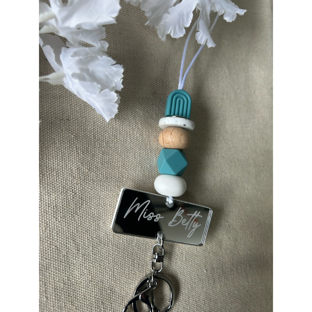 Joanna silicone beaded lanyard with a personalised engraved mirrored acrylic piece