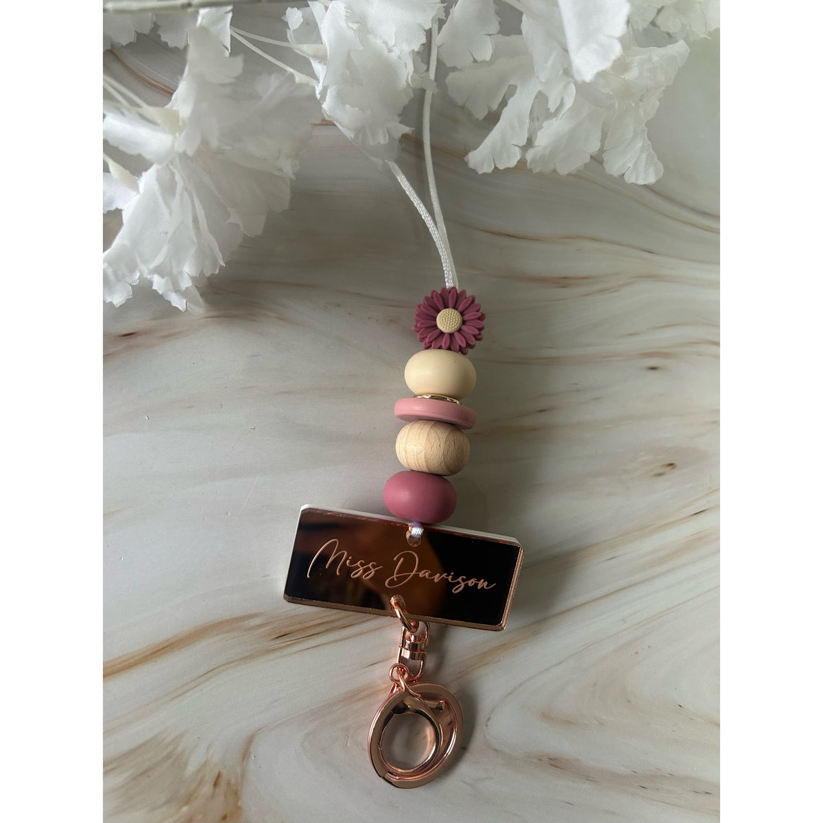 Victoria silicone beaded lanyard with a personalised engraved mirrored acrylic piece