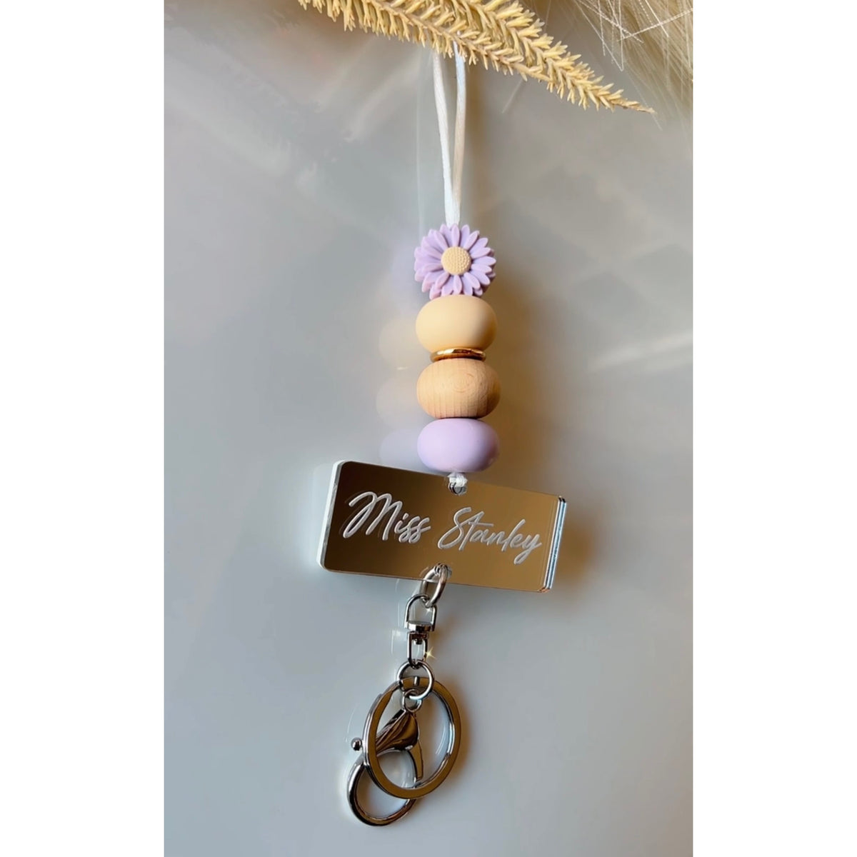 Personalised silicone beaded lanyard with engraved mirrored acrylic charm and matching lobster clasp