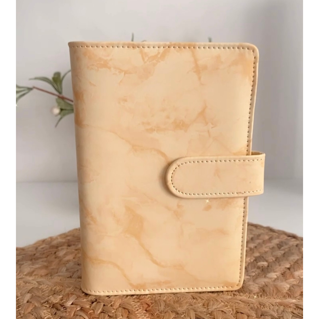 Yellow marble A6 budget binder with five cash envelopes for cash stuffing