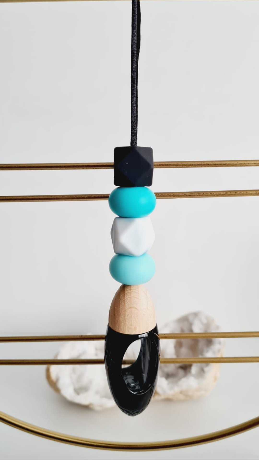 Tiffany personalised acrylic car diffuser hanging from a rear view mirror