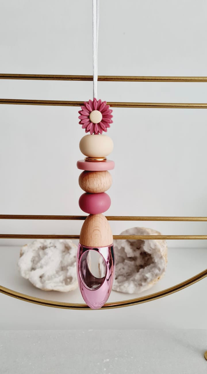 Victoria personalised acrylic car diffuser hanging from a rear view mirror